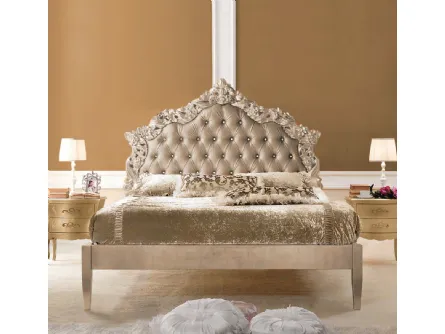 Letto in legno con testiera intagliata e imbottita Cristal di Baiardi