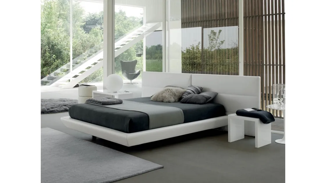 Letto in ecopelle con testiera Tolomeo di Rigosalotti